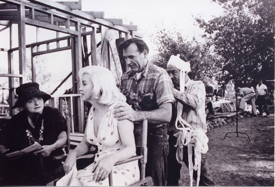 Paula Strasberg, Marilyn Monroe, Ralph Roberts, and Montgomery Clift massaging