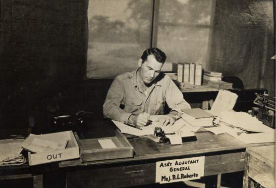 Ralph at his desk in Burma